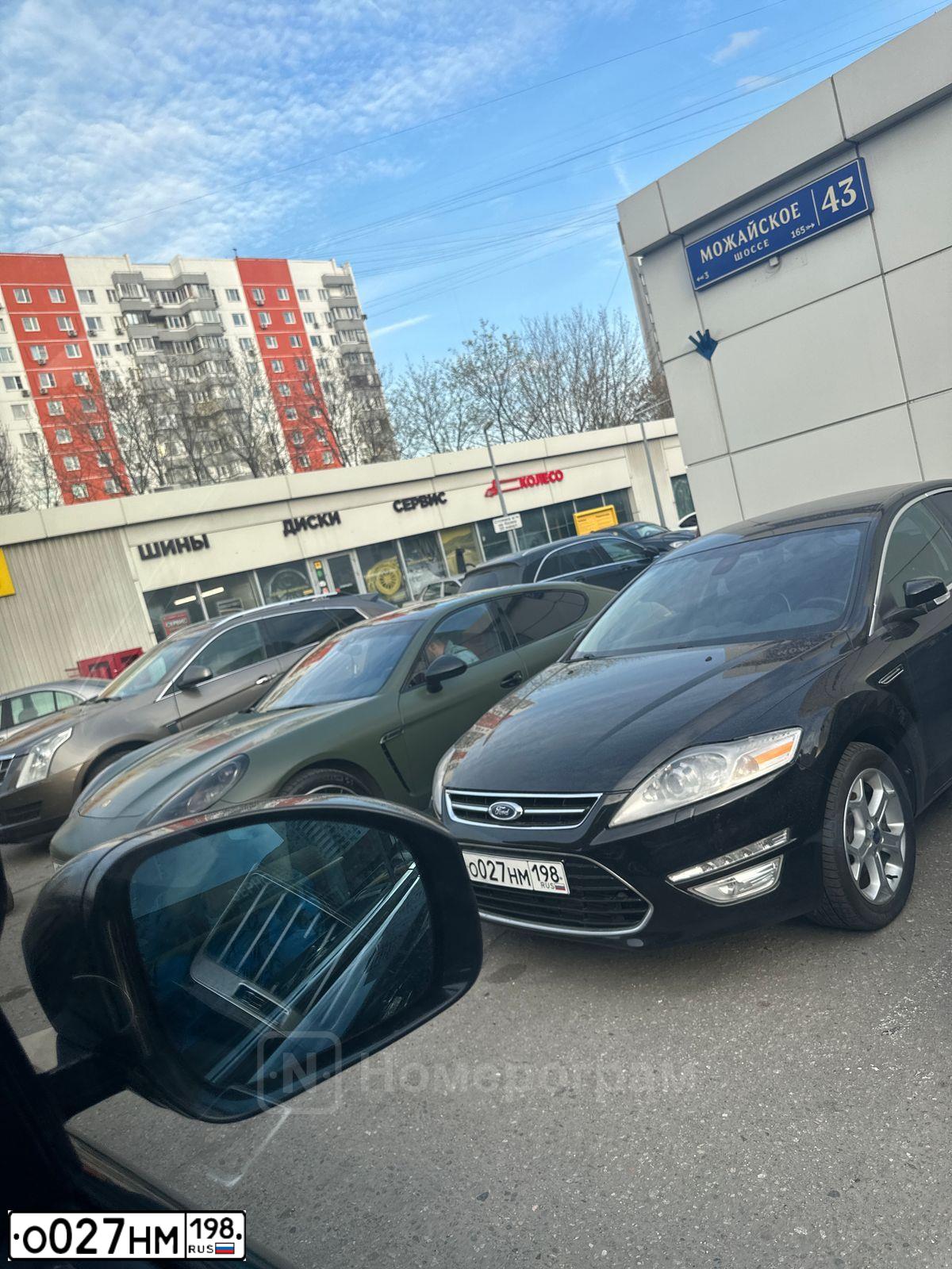 Фото автомобиля FORD MONDEO, 2011 — госномер О027НМ198. Цвет: ЧЕРНЫЙ