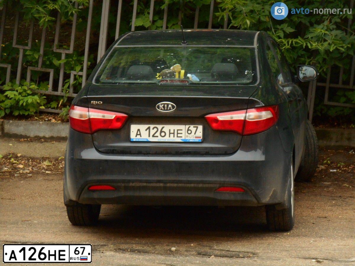 Фото автомобиля KIA RIO, 2012 — госномер А232РК67. Цвет: ЧЕРНЫЙ