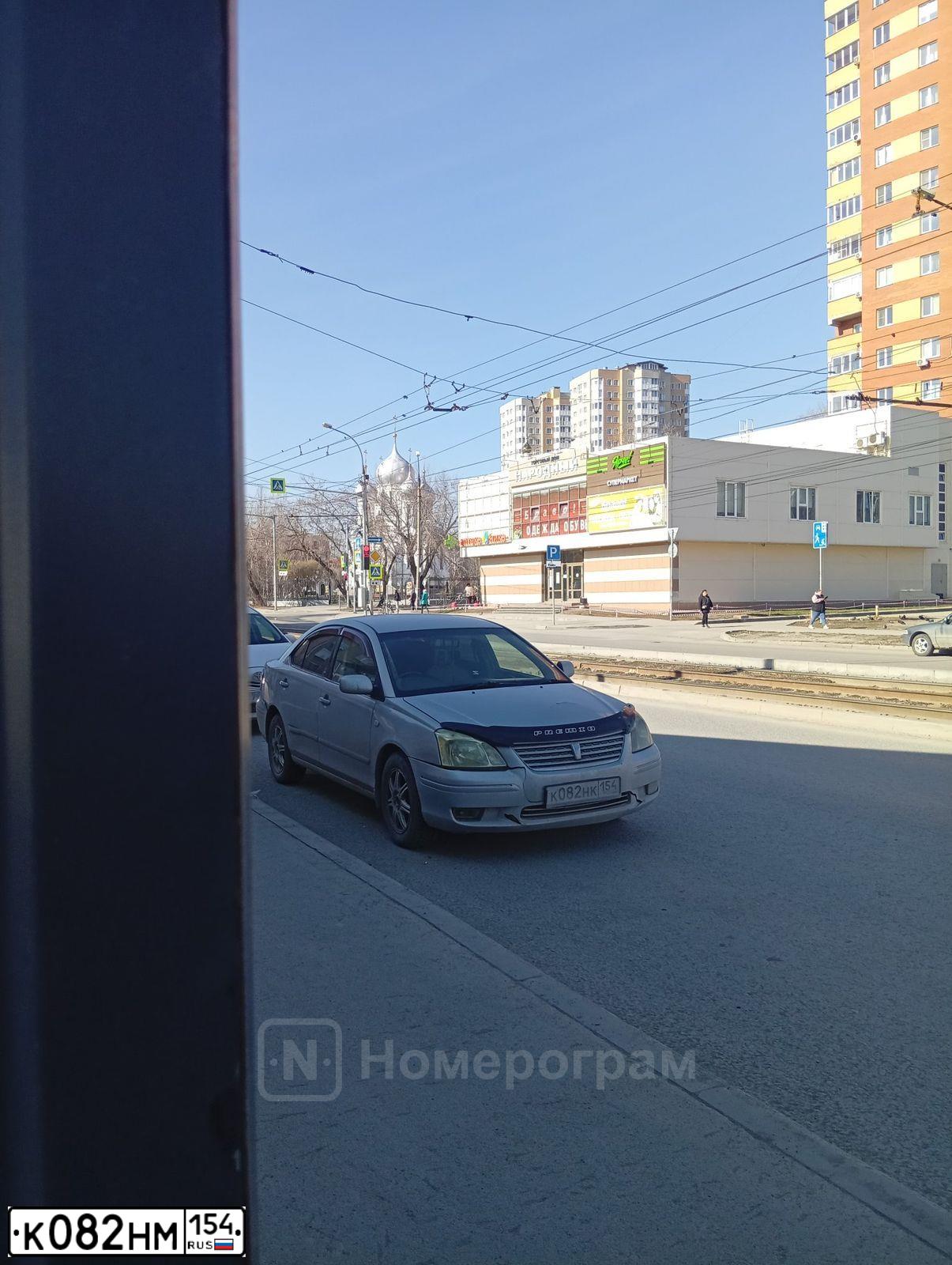 Фото автомобиля TOYOTA CAMRY, 2004 — госномер С650РУ154. Цвет: Красный