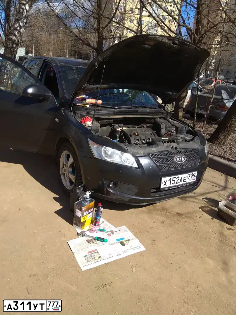 Фото автомобиля MITSUBISHI LANCER, 2003 — госномер В458АХ18. Цвет: СИНИЙ