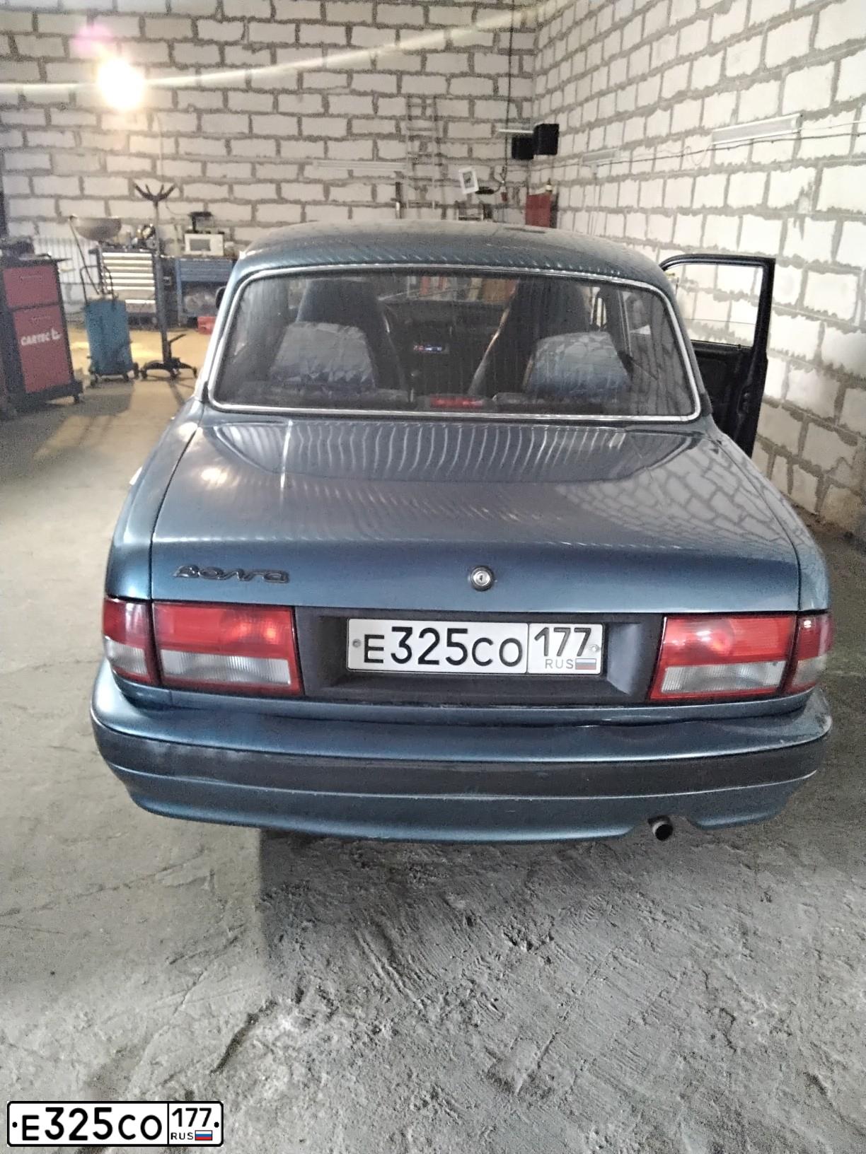 Фото автомобиля GAZ 3110 WOLGA, 2004 — госномер Е325СО177. Цвет: Серый