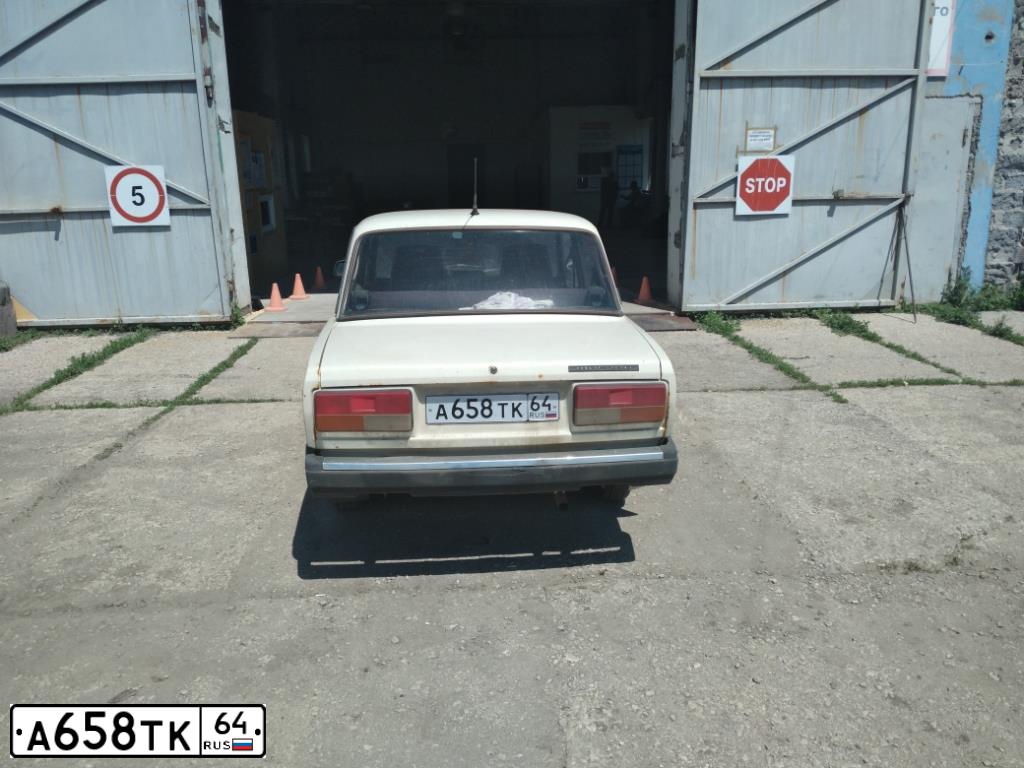 Фото автомобиля LADA 2107, 2001 — госномер А658ТК64. Цвет: БЕЛЫЙ