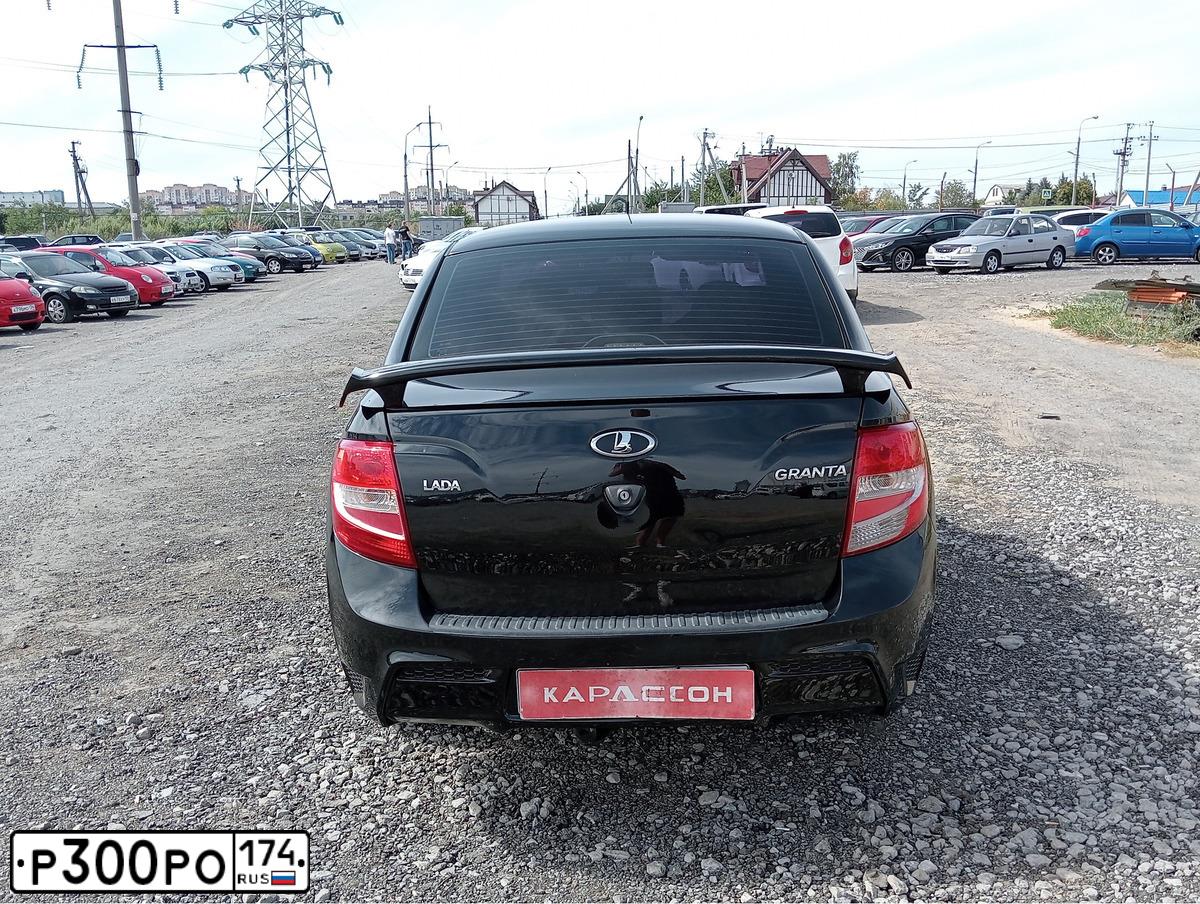 Фото автомобиля LADA 2190 GRANTA, 2015 — госномер К187ТЕ174. Цвет: ЧЕРНЫЙ