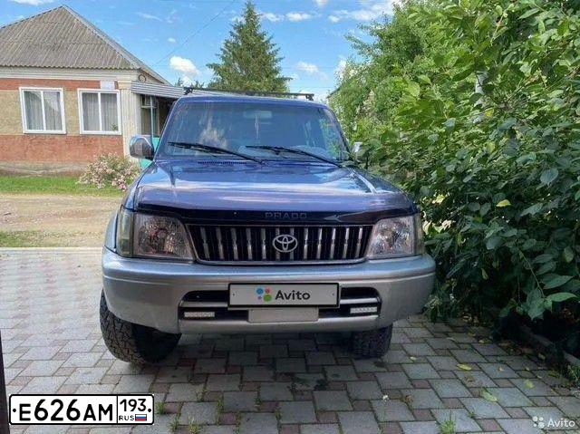 Фото автомобиля TOYOTA LANDCRUISER, 1997 — госномер У243СЕ77. Цвет: СИНИЙ ТЕМНЫЙ