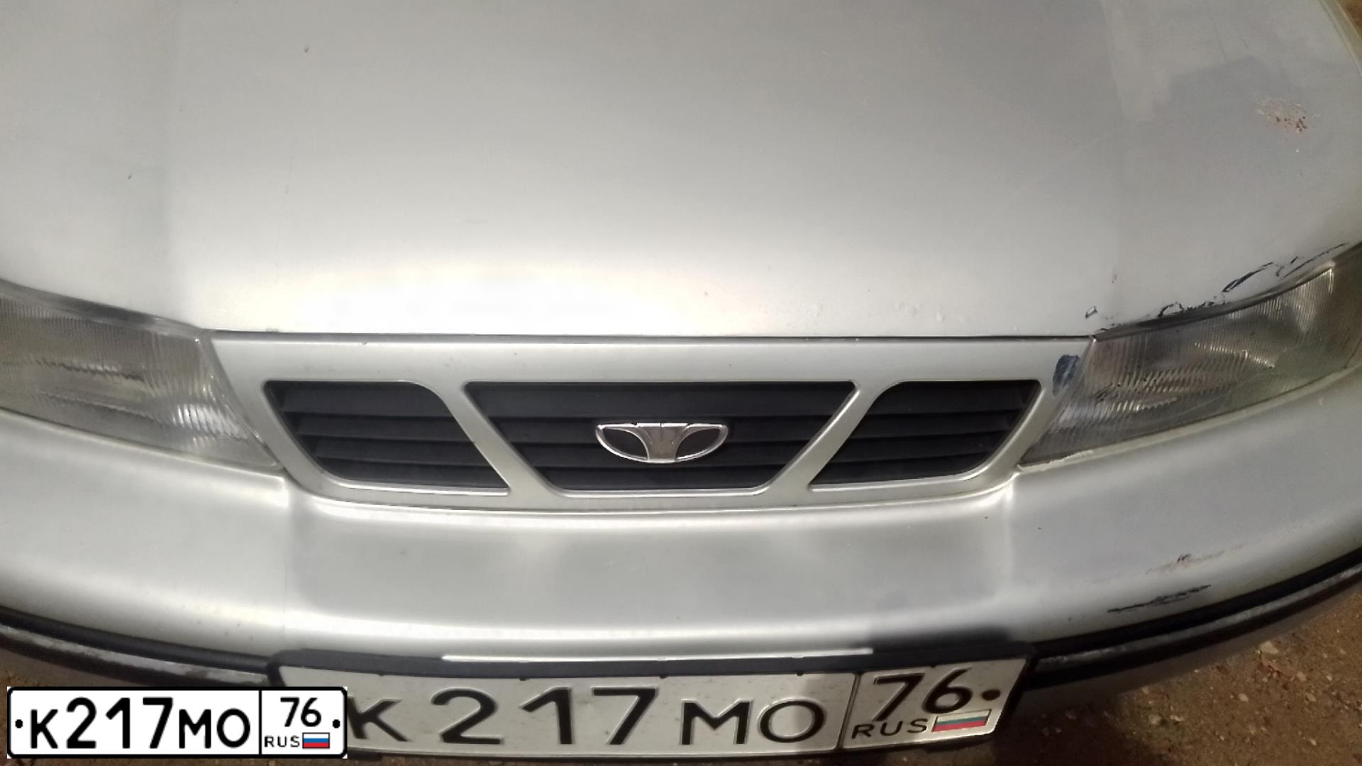 Фото автомобиля DAEWOO NEXIA, 2005 — госномер У163ТТ33. Цвет: СЕРЫЙ