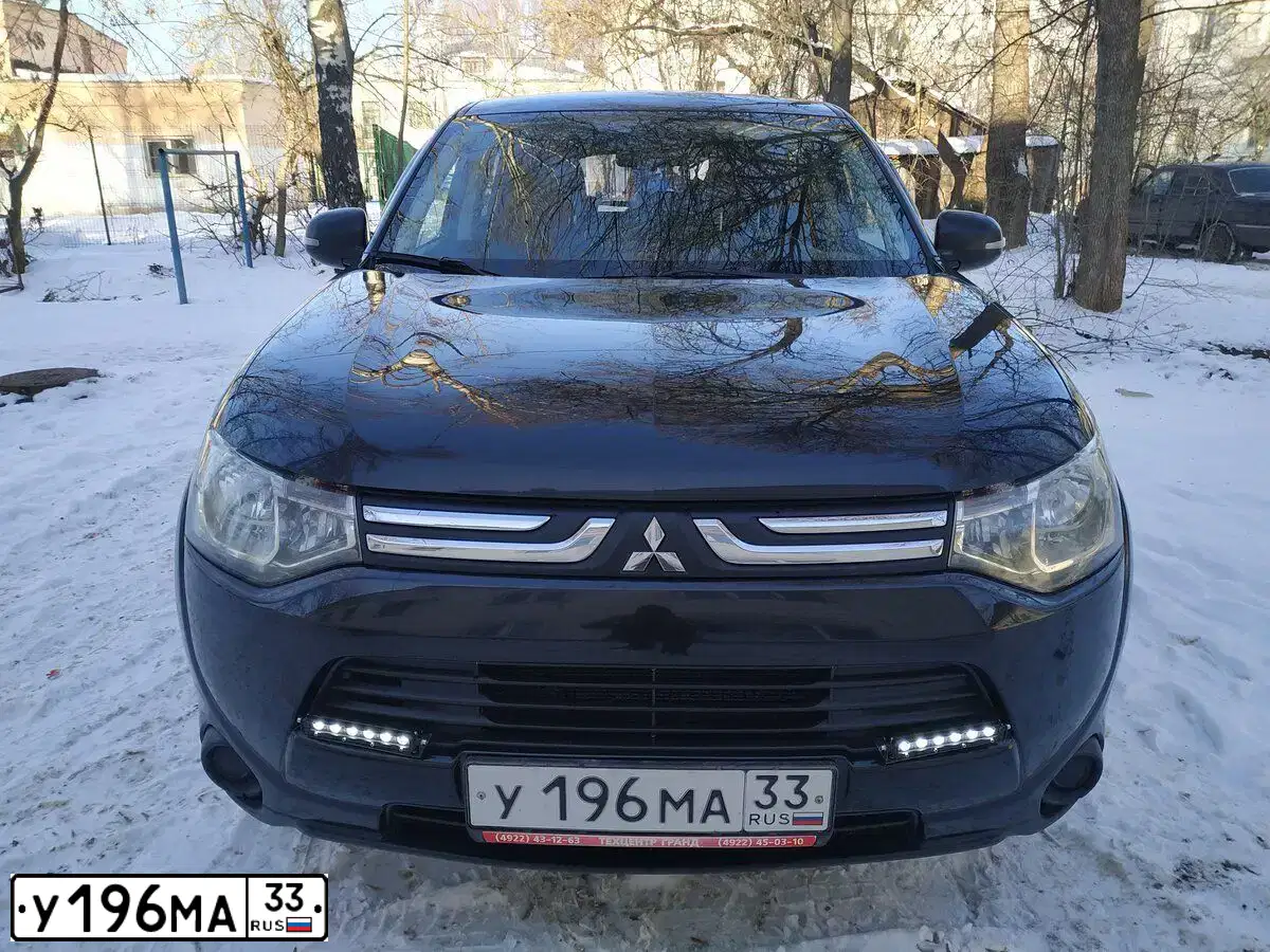 Фото автомобиля MITSUBISHI OUTLANDER, 2012 — госномер А991УА252. Цвет: ЧЕРНЫЙ