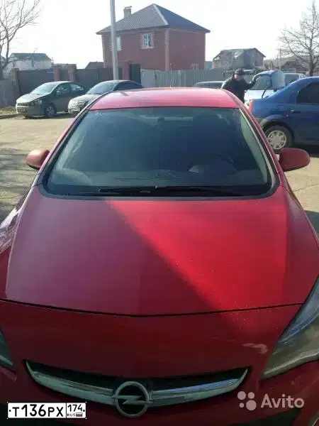 Фото автомобиля OPEL ASTRA, 2012 — госномер Н558ХА174. Цвет: КРАСНЫЙ