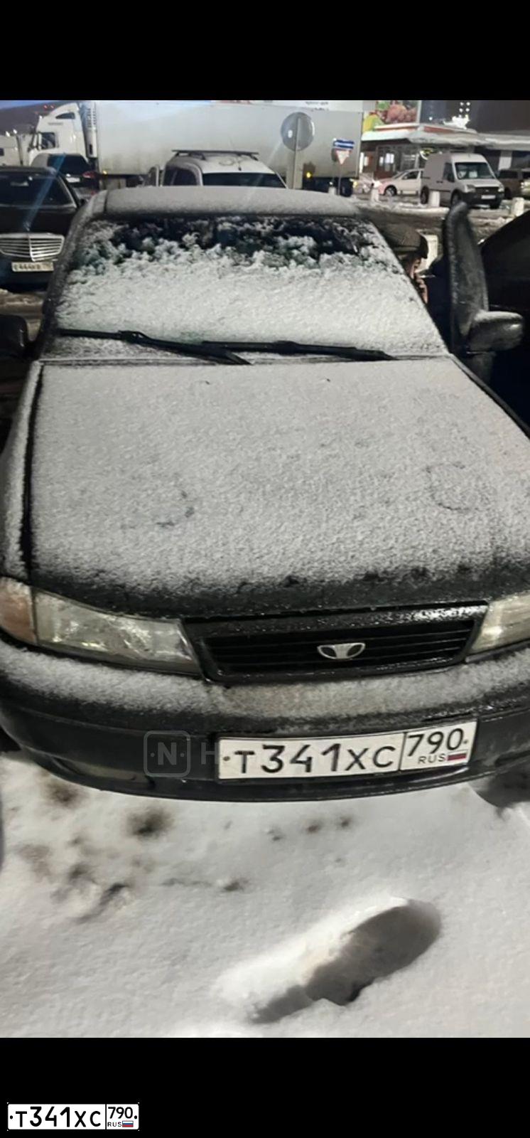 Фото автомобиля DAEWOO NEXIA, 2002 — госномер Т341ХС790. Цвет: СЕРО-ЗЕЛЕНЫЙ