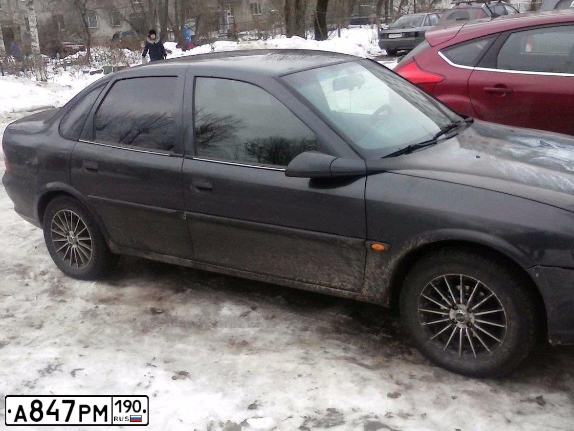 Фото автомобиля OPEL VECTRA, 1996 — госномер А847РМ190. Цвет: ЧЕРНЫЙ