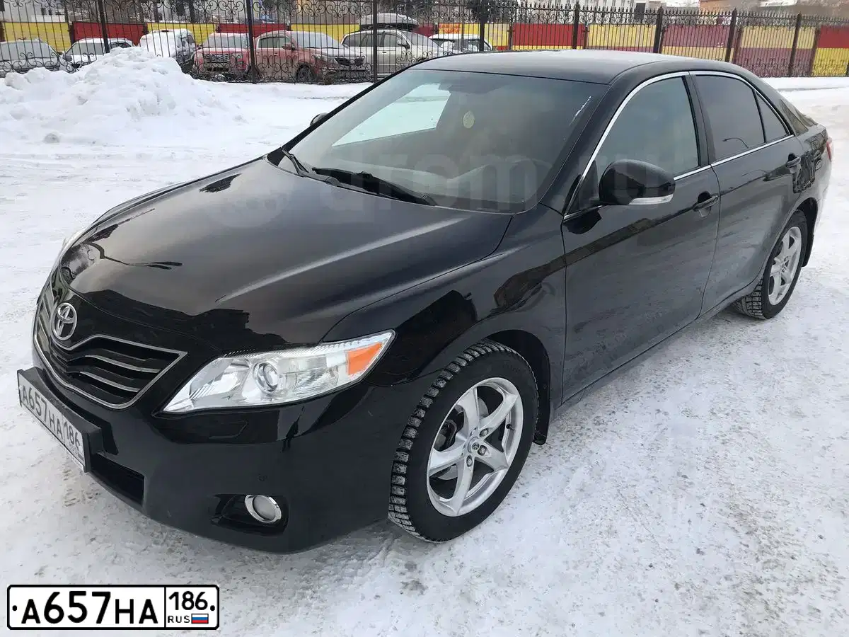 Фото автомобиля TOYOTA CAMRY, 2010 — госномер А657НА186. Цвет: ЧЕРНЫЙ