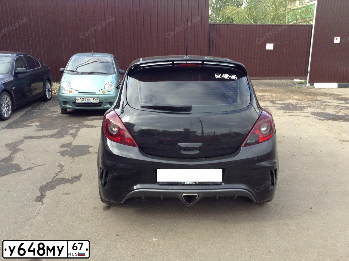 Фото автомобиля OPEL CORSA, 2008 — госномер К909ОА797. Цвет: ЧЕРНЫЙ