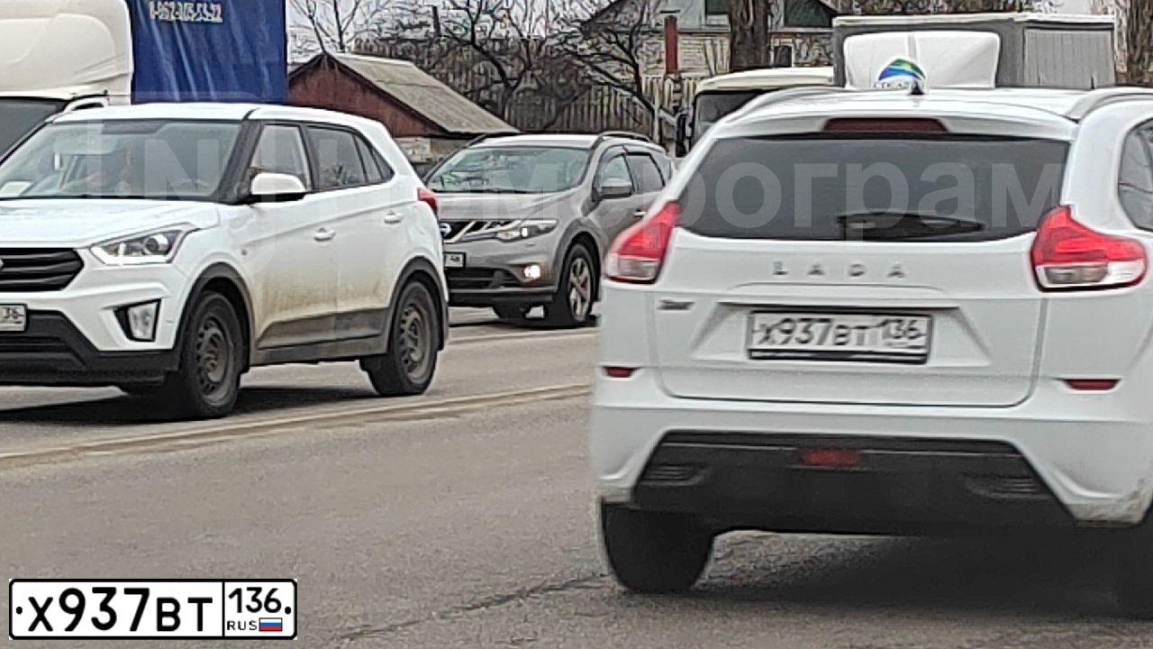 Фото автомобиля VAZ LADA XRAY GАВ110, 2021 — госномер Х937ВТ136. Цвет: Белый