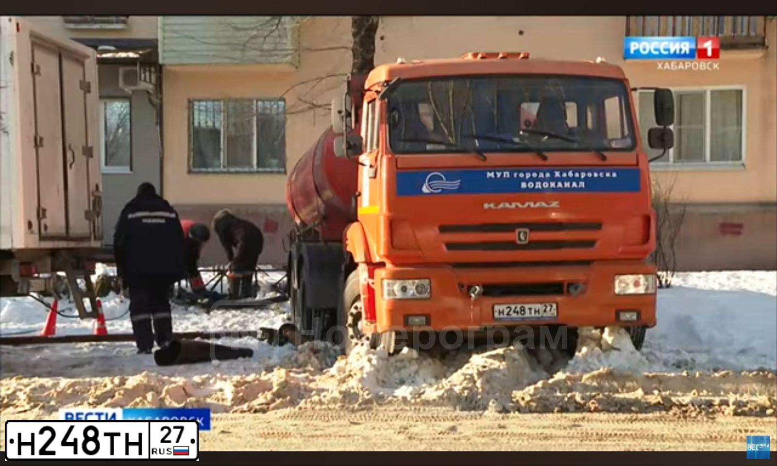 Фото автомобиля KAMAZ 65115 /6X4/, 2015 — госномер Н248ТН27. Цвет: ОРАНЖЕВЫЙ