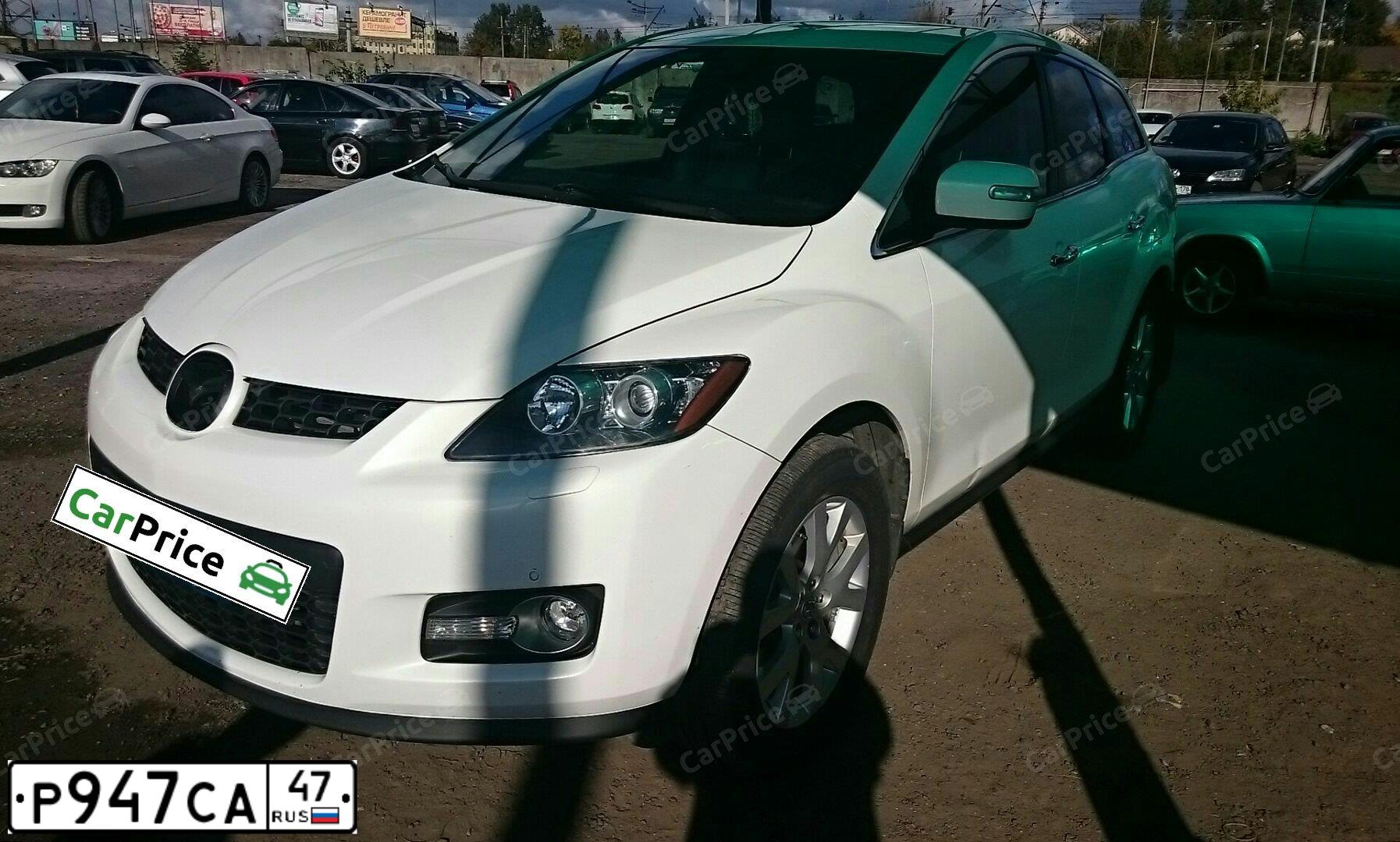 Фото автомобиля MAZDA CX-7, 2008 — госномер Н016НО198. Цвет: БЕЛЫЙ