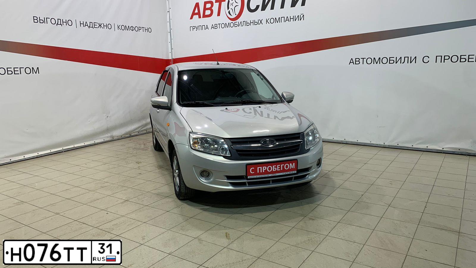 Фото автомобиля LADA GRANTA, 2014 — госномер Р003ЕА46. Цвет: Серебристый