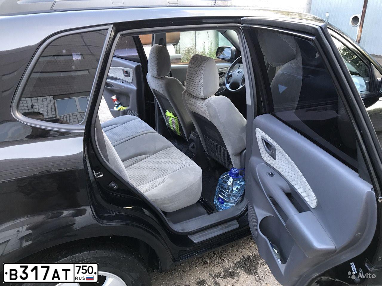 Фото автомобиля HYUNDAI TUCSON, 2005 — госномер В317АТ750. Цвет: ЧЕРНЫЙ