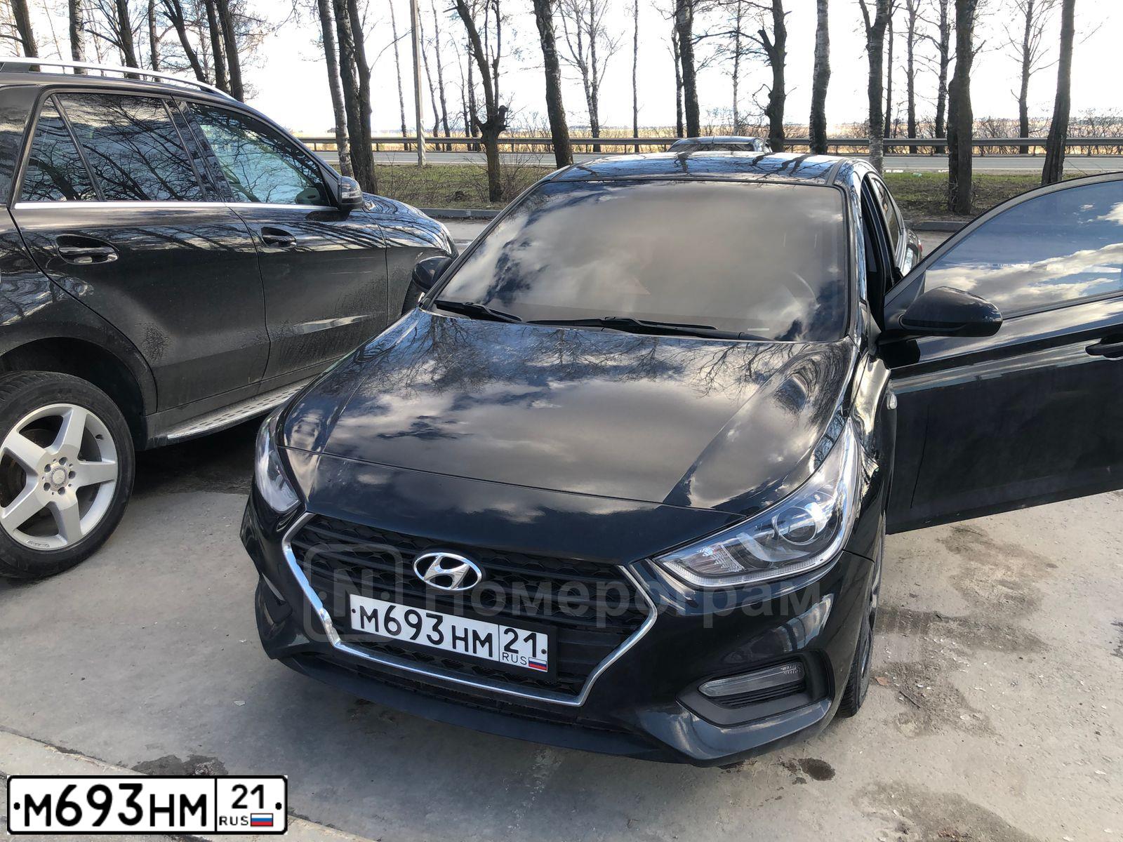 Фото автомобиля HYUNDAI SOLARIS, 2018 — госномер М693НМ21. Цвет: ЧЕРНЫЙ