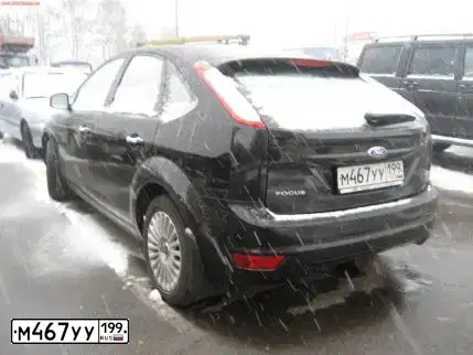 Фото автомобиля FORD FOCUS, 2010 — госномер М467УУ199. Цвет: ЧЕРНЫЙ