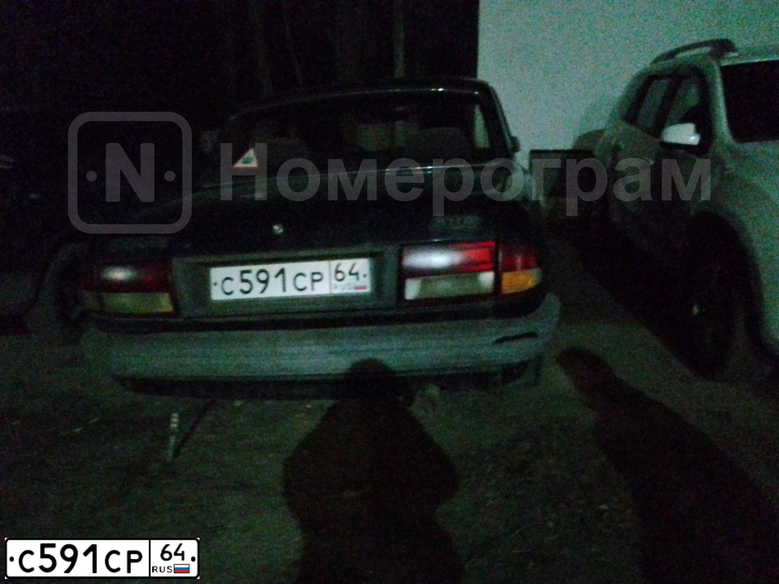Фото автомобиля GAZ 3110 WOLGA, 1997 — госномер С591СР64. Цвет: ЧЕРНЫЙ