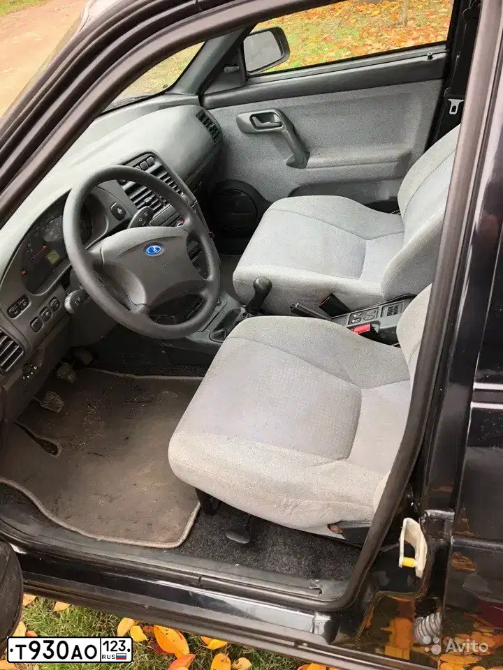 Фото автомобиля LADA 2111, 2009 — госномер Т930АО123. Цвет: Сине-Черный