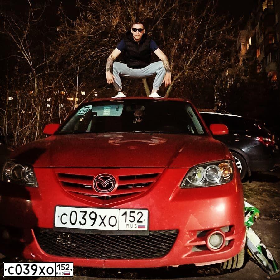 Фото автомобиля MAZDA 3, 2005 — госномер Т335ВА790. Цвет: Красный