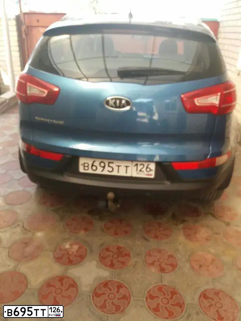 Фото автомобиля KIA SPORTAGE, 2010 — госномер О629ВВ126. Цвет: синий
