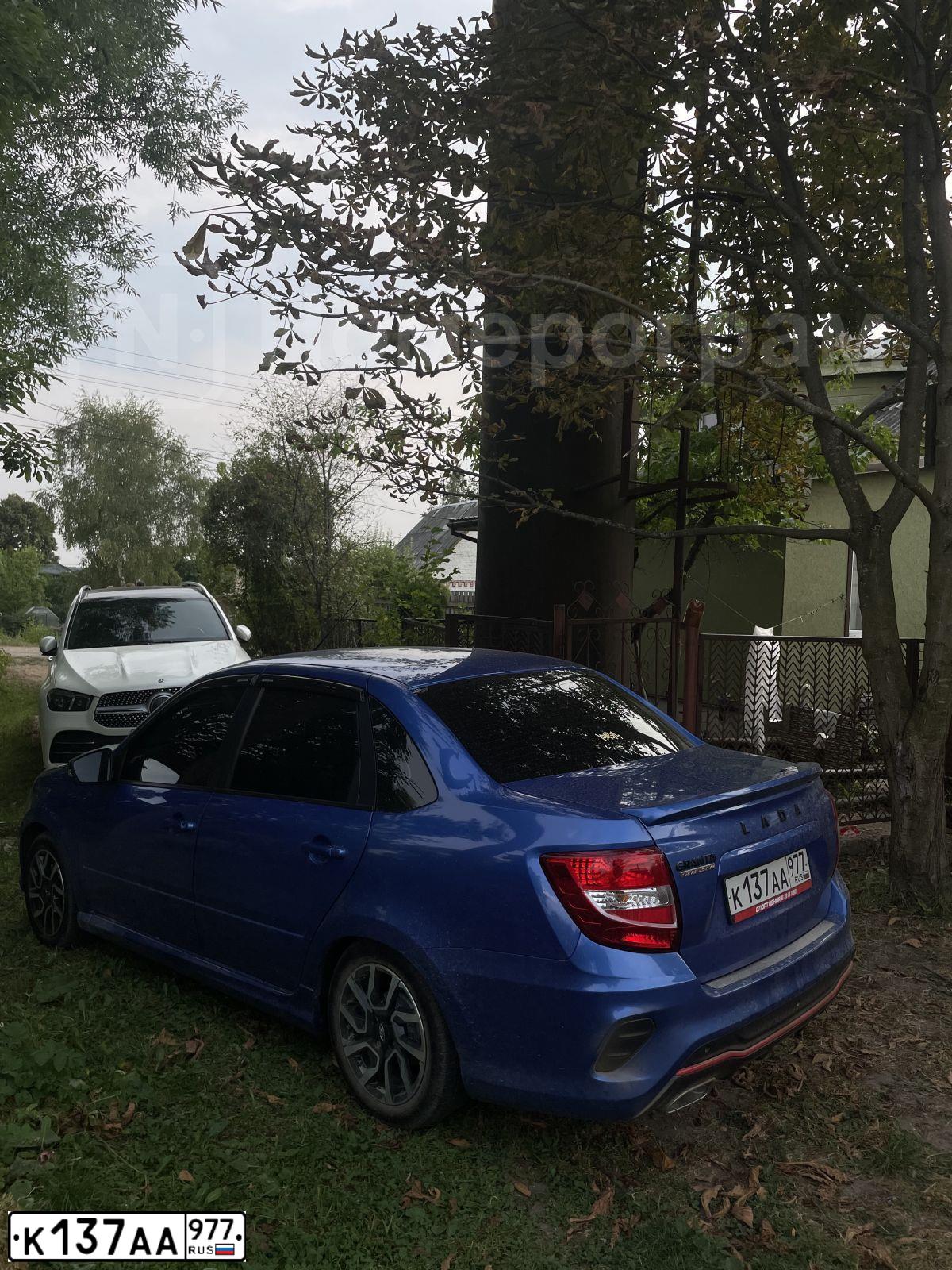 Фото автомобиля LADA GRANTA DRIVE ACTIVE, 2022 — госномер К137АА977. Цвет: синий