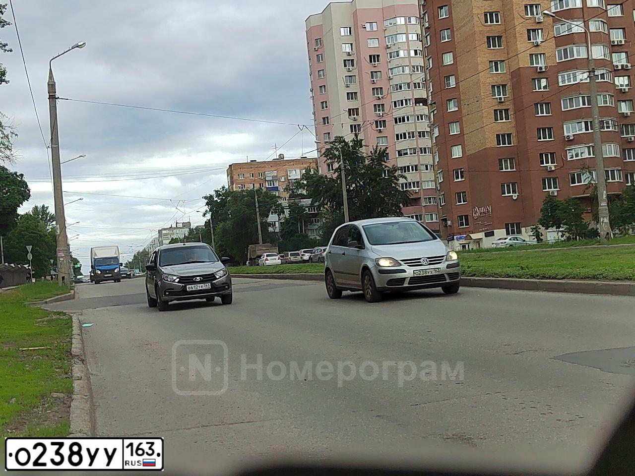 Фото автомобиля LADA 2115 SAMARA, 2005 — госномер М750ВЕ763. Цвет: Серебристо-желто-голубой