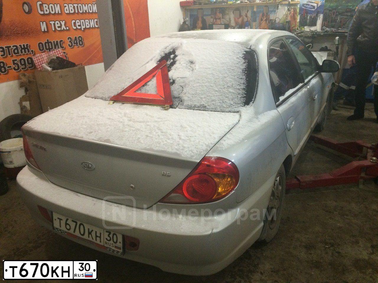 Фото автомобиля KIA SPECTRA, 2008 — госномер Е851МВ30. Цвет: Серебристый