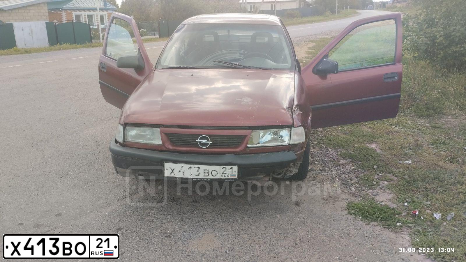 Фото автомобиля OPEL VECTRA, 1994 — госномер Т053МВ58. Цвет: Красный