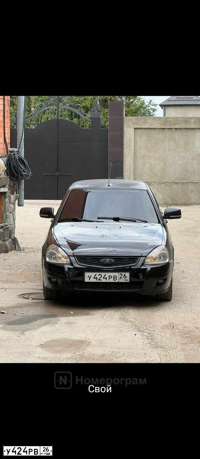 Фото автомобиля LADA 2170 PRIORA, 2011 — госномер У424РВ26. Цвет: СИНЕ-ЧЕРНЫЙ