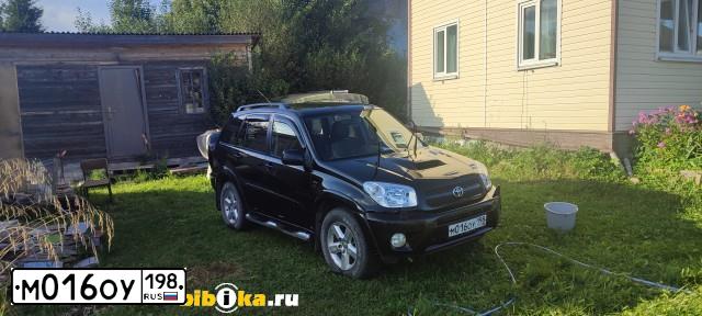 Фото автомобиля TOYOTA RAV4, 2004 — госномер М016ОУ198. Цвет: ЧЕРНЫЙ
