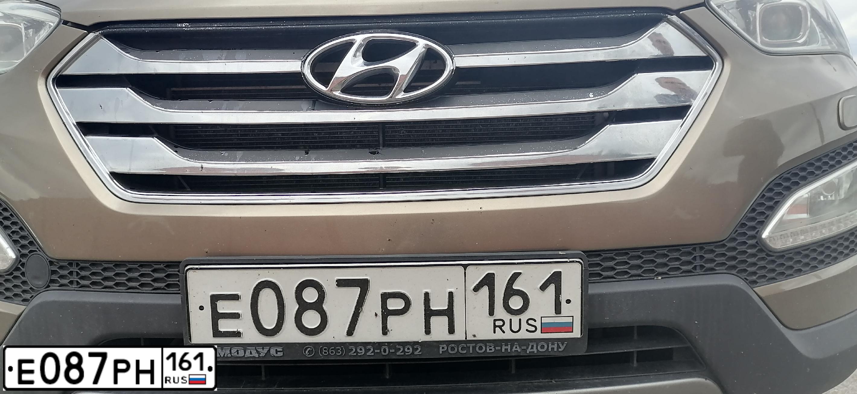 Фото автомобиля HYUNDAI SANTA FE, 2012 — госномер Е087РН161. Цвет: ЗОЛОТИСТЫЙ