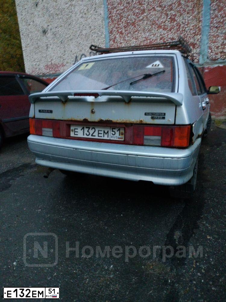 Фото автомобиля LADA 2114 SAMARA, 2004 — госномер Е132ЕМ51. Цвет: Серебристо-Желтый