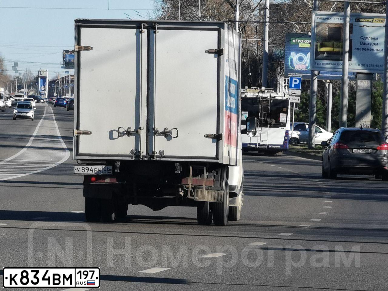 Фото автомобиля KIA SOUL, 2010 — госномер Х295НМ797. Цвет: ЧЕРНЫЙ