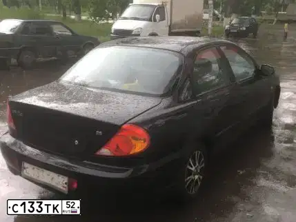 Фото автомобиля KIA SPECTRA, 2006 — госномер С133ТК52. Цвет: ЧЕРНЫЙ
