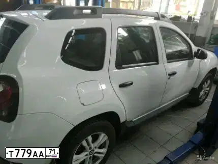 Фото автомобиля RENAULT DUSTER, 2016 — госномер Т779АА71. Цвет: Белый