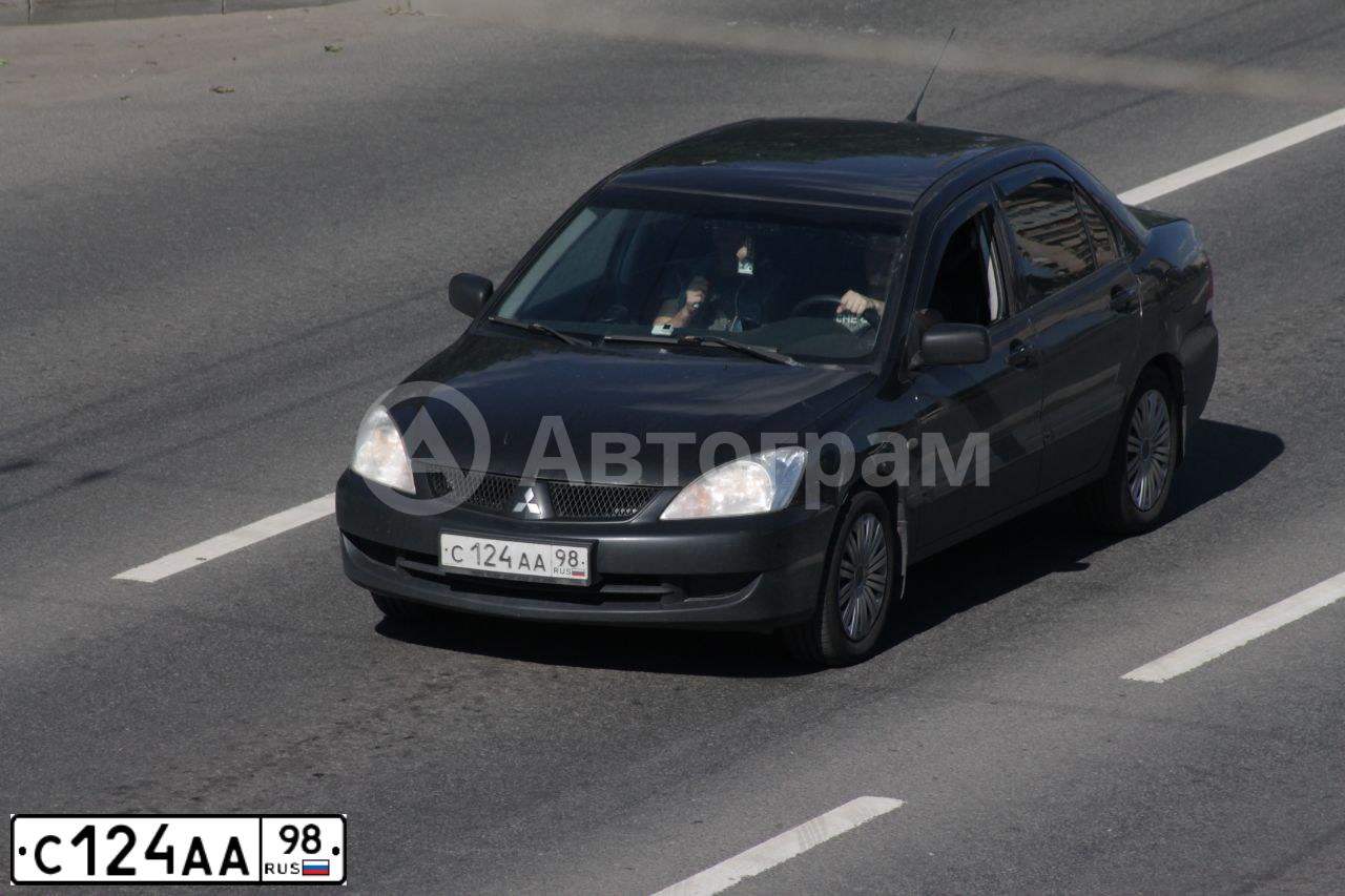 Фото автомобиля MITSUBISHI LANCER, 2007 — госномер С124АА98. Цвет: ЧЕРНЫЙ