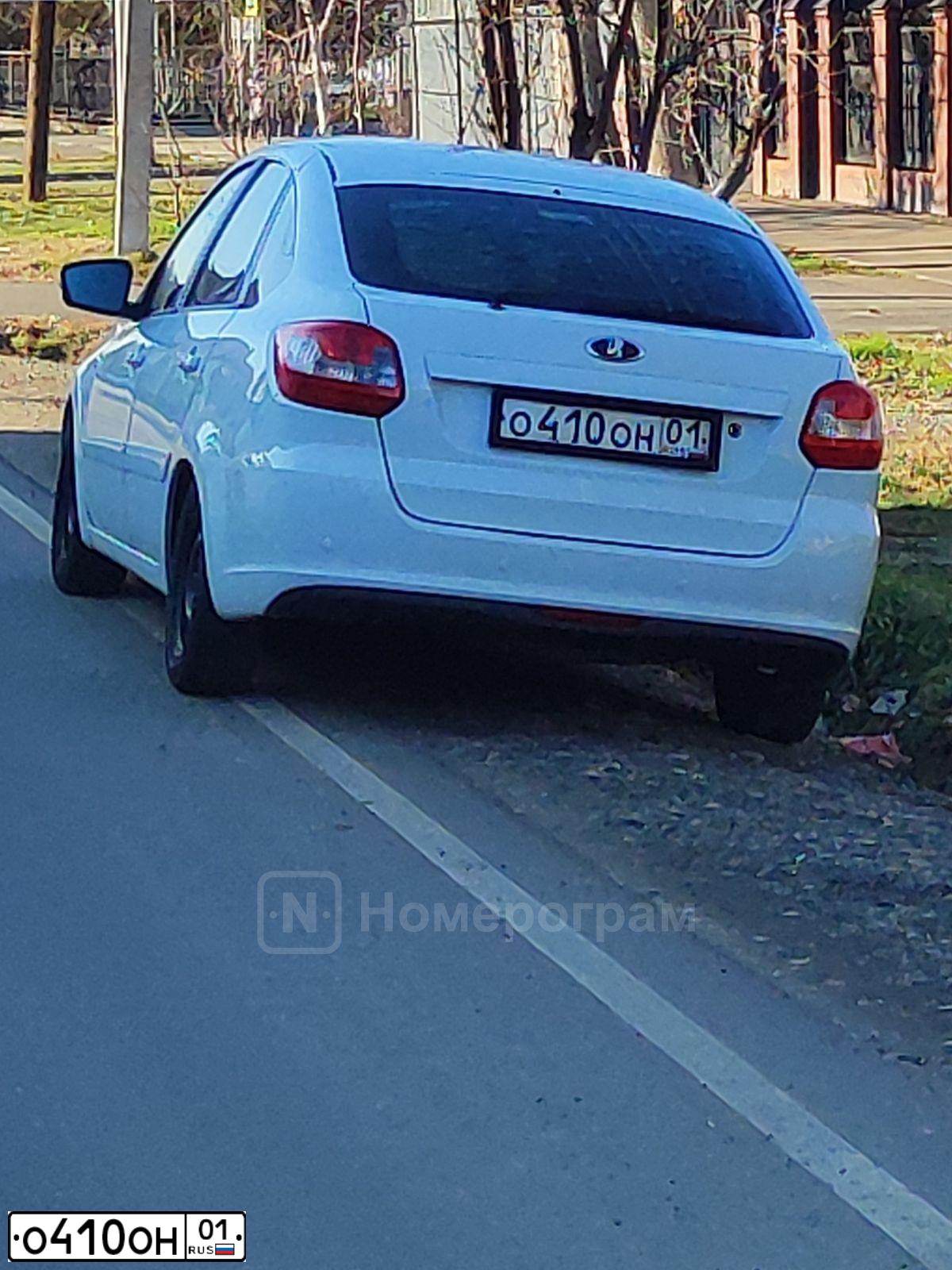 Фото автомобиля LADA 2191 GRANTA, 2014 — госномер О410ОН01. Цвет: БЕЛЫЙ