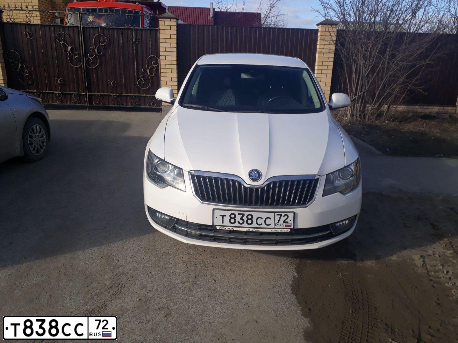 Фото автомобиля LADA 2192 KALINA, 2013 — госномер Т878СС72. Цвет: Оранжевый