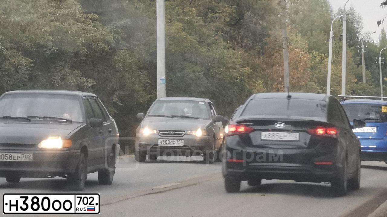 Фото автомобиля HONDA CIVIC, 2008 — госномер Н380ОО702. Цвет: ЧЕРНЫЙ