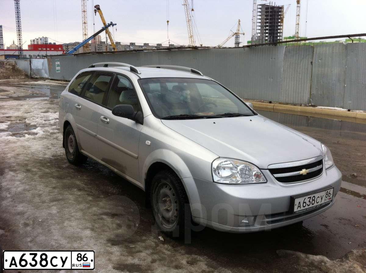 Фото автомобиля CHEVROLET LACETTI, 2008 — госномер М158НО186. Цвет: СЕРЕБРИСТЫЙ