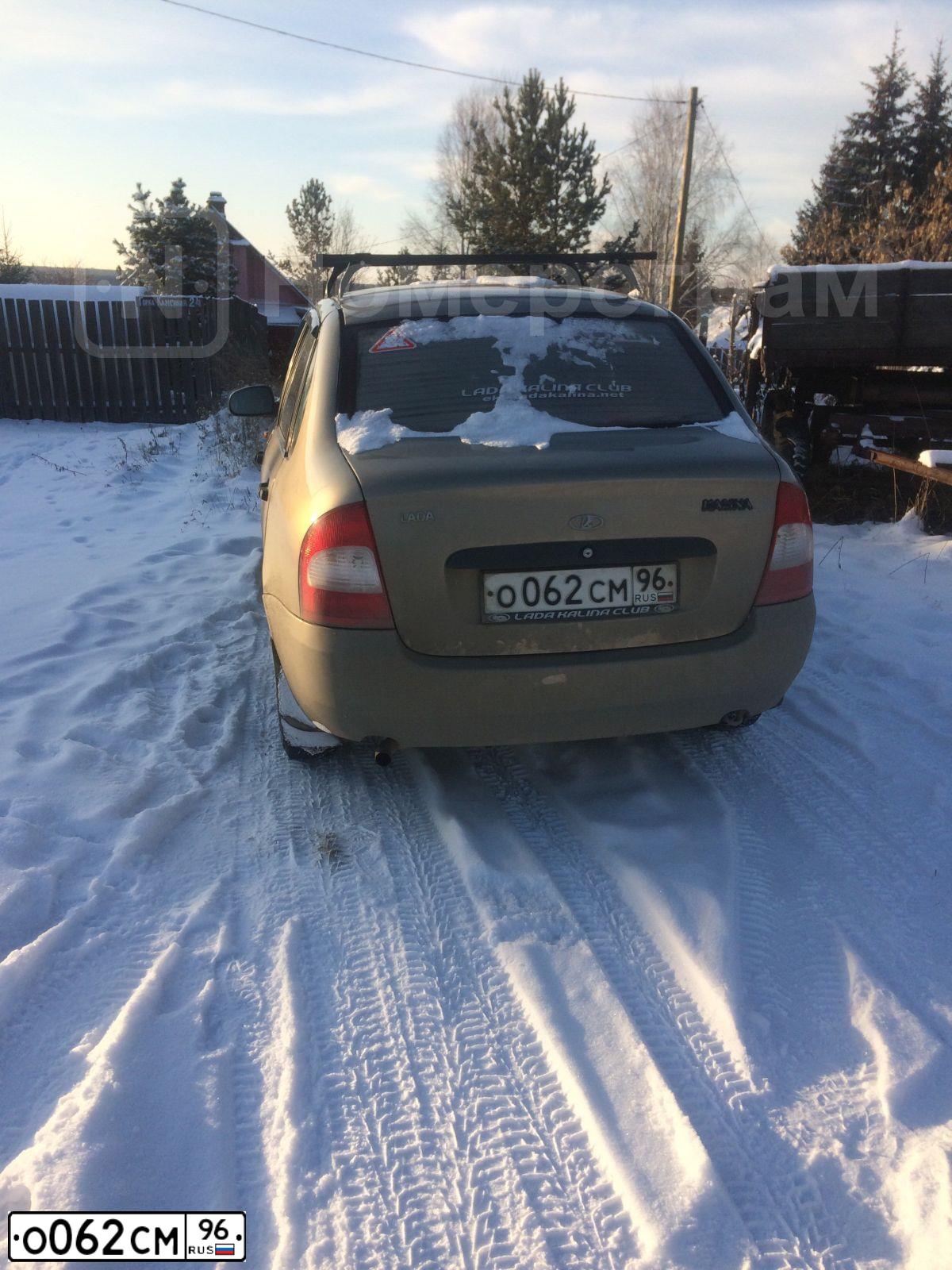 Фото автомобиля LADA KALINA, 2006 — госномер Е104ТС702. Цвет: БЕЖЕВО-СЕРЫЙ