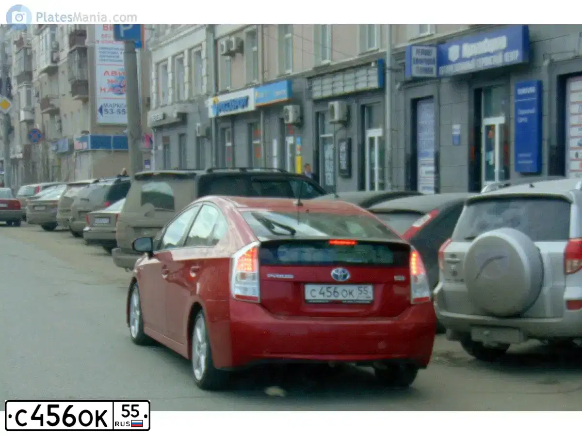 Фото автомобиля TOYOTA PRIUS, 2009 — госномер С456ОК55. Цвет: КРАСНЫЙ