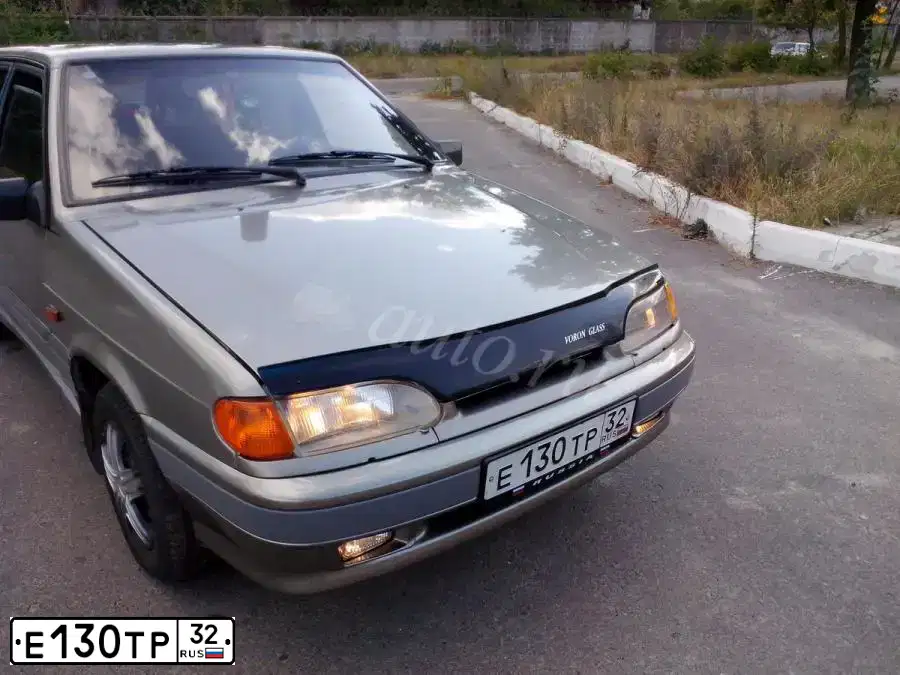 Фото автомобиля LADA 2115 SAMARA, 2002 — госномер Е130ТР32. Цвет: СЕРЕБРИСТЫЙ СЕРО-ЗЕЛЕНЫЙ