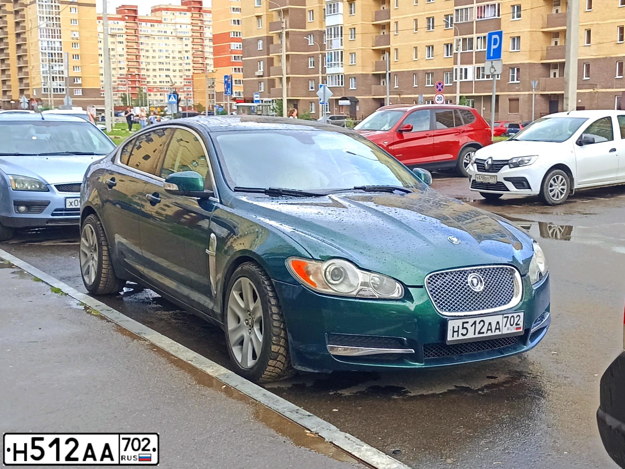 Фото автомобиля JAGUAR XF-SERIE, 2008 — госномер Н512АА702. Цвет: ЗЕЛЕНЫЙ