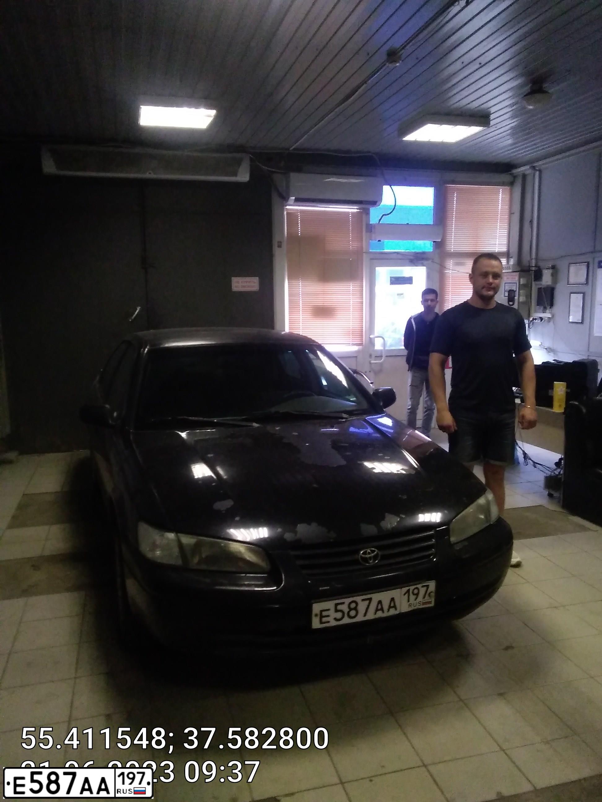 Фото автомобиля TOYOTA CAMRY, 1998 — госномер Н875КС21. Цвет: ЧЕРНЫЙ