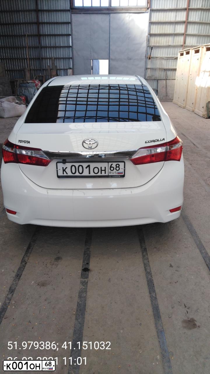 Фото автомобиля TOYOTA COROLLA, 2014 — госномер К001ОН68. Цвет: Белый
