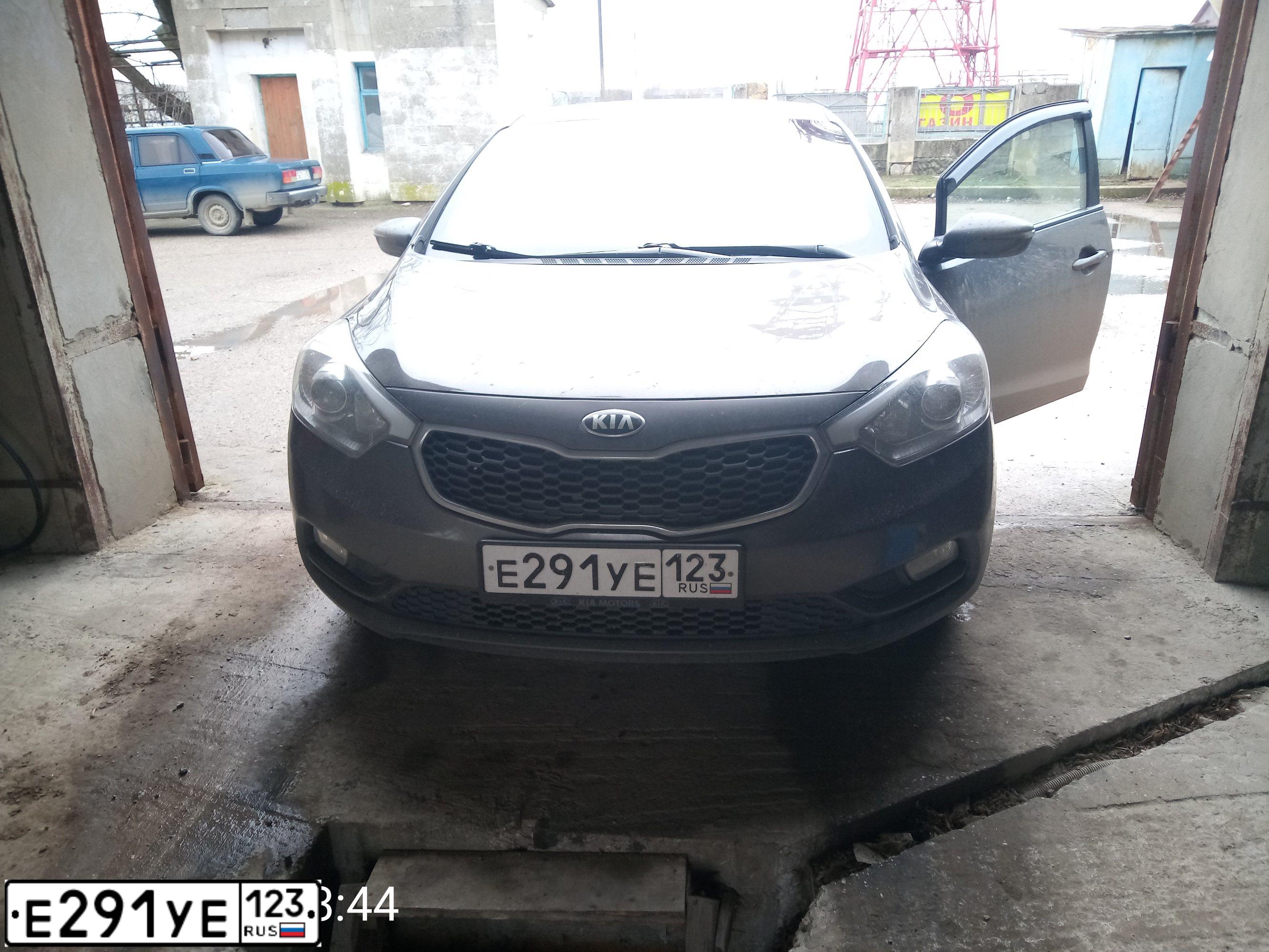 Фото автомобиля KIA CERATO, 2013 — госномер Е291УЕ123. Цвет: Серый