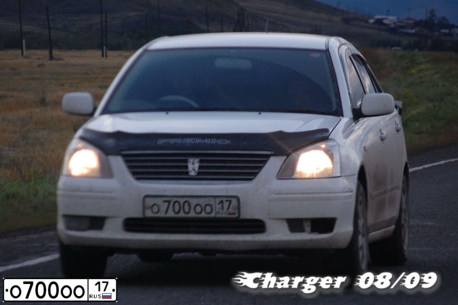 Фото автомобиля TOYOTA COROLLA, 2008 — госномер О700ОО17. Цвет: ЧЕРНЫЙ